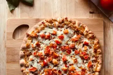 pizza on brown wooden table